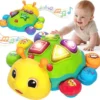 11-6-600x587-1.webp Bilingual Spanish English Plastic Early Learning Light Sound Tummy Time Infant Development Musical Baby Crawling Toy