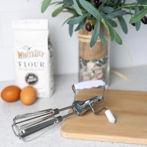 88d5a013f05307e822ee44810436cd43e79a53d1ab1c1630c66b43c9f3699d56.jpg Stainless Steel Manual Hand Mixer