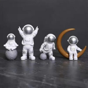 cfc4a19e330fe0db10a002069f61bc47354b4c0c9d89b469d1db88b72e857235.jpg Blue White Astronaut Statues Set of 4